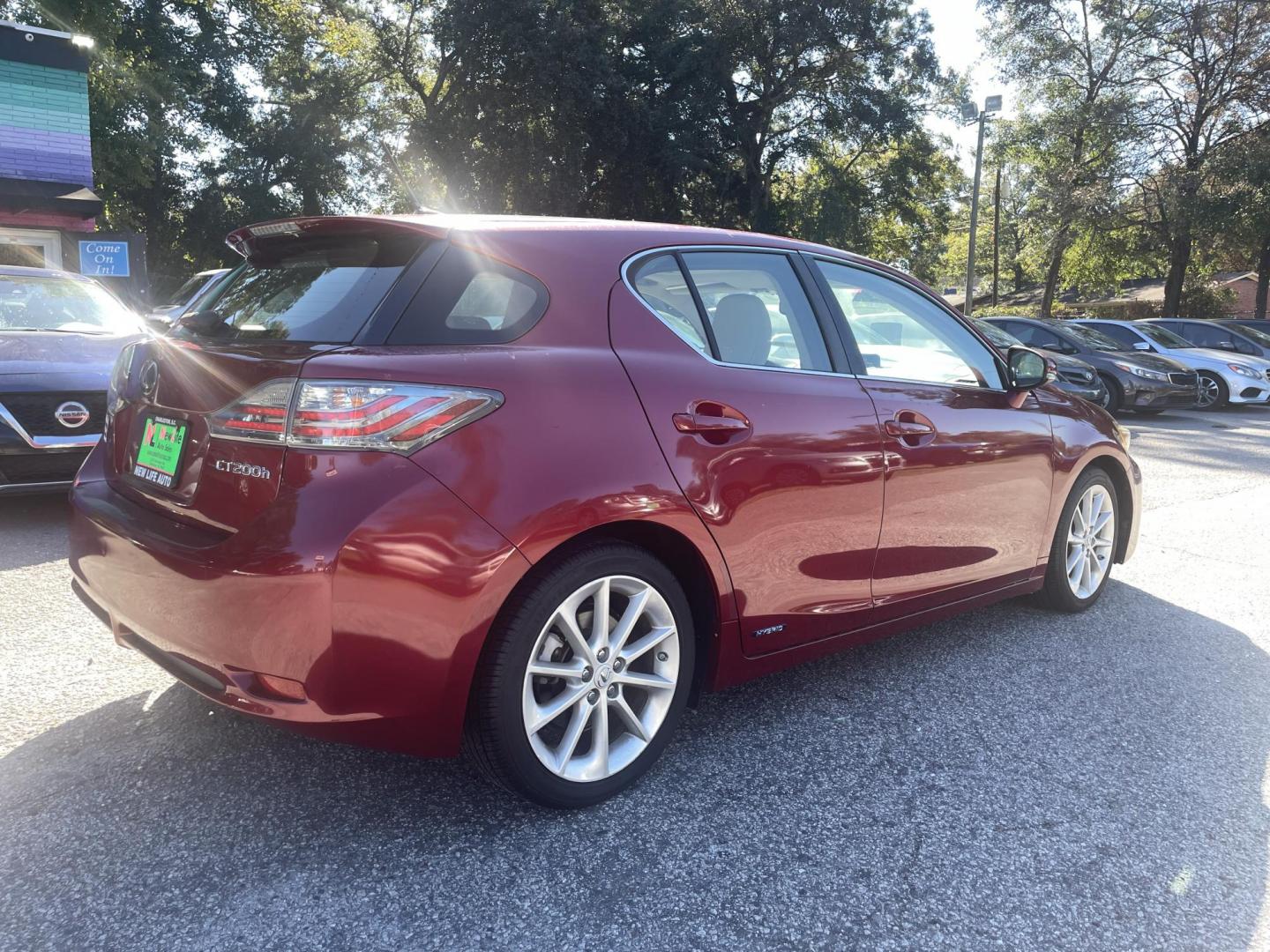 2013 RED LEXUS CT 200 (JTHKD5BH3D2) with an 1.8L engine, Automatic transmission, located at 5103 Dorchester Rd., Charleston, SC, 29418-5607, (843) 767-1122, 36.245171, -115.228050 - Local Trade-in with Leather, Sunroof, CD/AUX/Sat/Bluetooth, Navigation, Backup Camera, Dual Climate Control, Power Everything (locks, seats, mirrors), Heated Seats, Push Button Start, Keyless Entry, Alloy Wheels. Only 106k miles! Located at New Life Auto Sales! 2023 WINNER for Post & Courier's Char - Photo#6