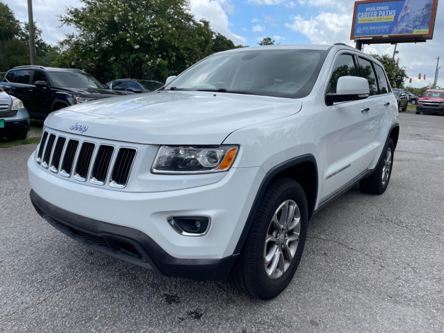2014 WHITE JEEP GRAND CHEROKEE LIMITED (1C4RJFBG4EC) with an 3.6L engine, Automatic transmission, located at 5103 Dorchester Rd., Charleston, SC, 29418-5607, (843) 767-1122, 36.245171, -115.228050 - Local Trade-in with Leather, Sunroof, Navigation, Backup Camera, Bluetooth/AUX/Radio, Dual Climate Control, Power Everything (windows, locks, seats, mirrors), Heated/Memory Seats, Heated Steering Wheel, Power Liftgate, Rear Power Inverter, Rear Heated Seats, Push Button Start, Keyless Entry, Alloy W - Photo#2