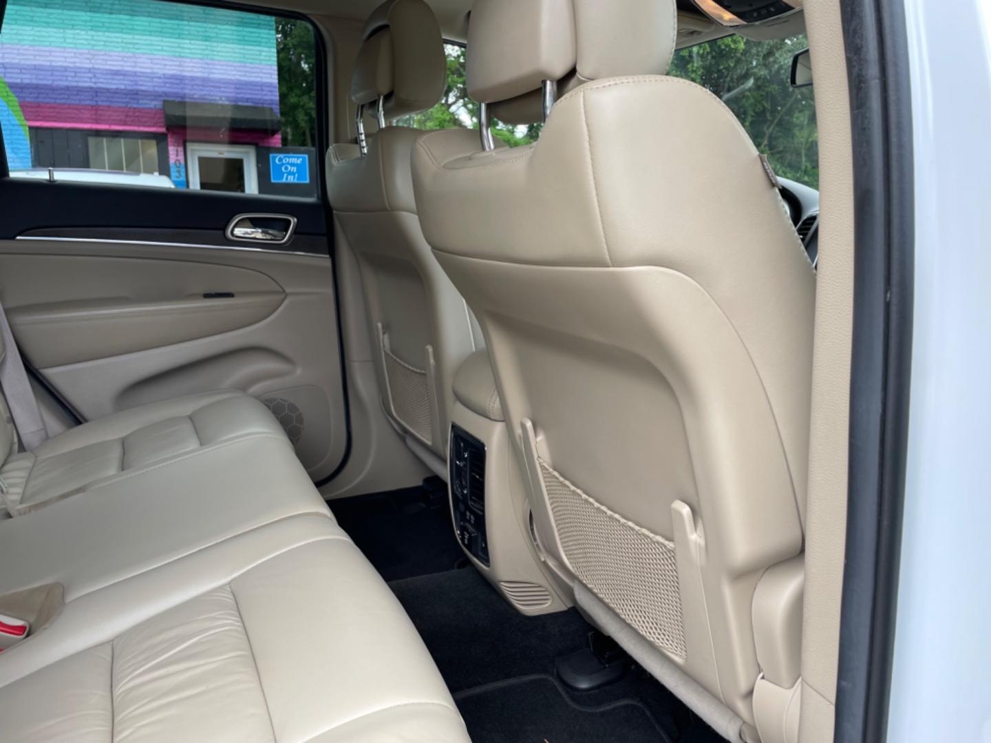 2014 WHITE JEEP GRAND CHEROKEE LIMITED (1C4RJFBG4EC) with an 3.6L engine, Automatic transmission, located at 5103 Dorchester Rd., Charleston, SC, 29418-5607, (843) 767-1122, 36.245171, -115.228050 - Local Trade-in with Leather, Sunroof, Navigation, Backup Camera, Bluetooth/AUX/Radio, Dual Climate Control, Power Everything (windows, locks, seats, mirrors), Heated/Memory Seats, Heated Steering Wheel, Power Liftgate, Rear Power Inverter, Rear Heated Seats, Push Button Start, Keyless Entry, Alloy W - Photo#11