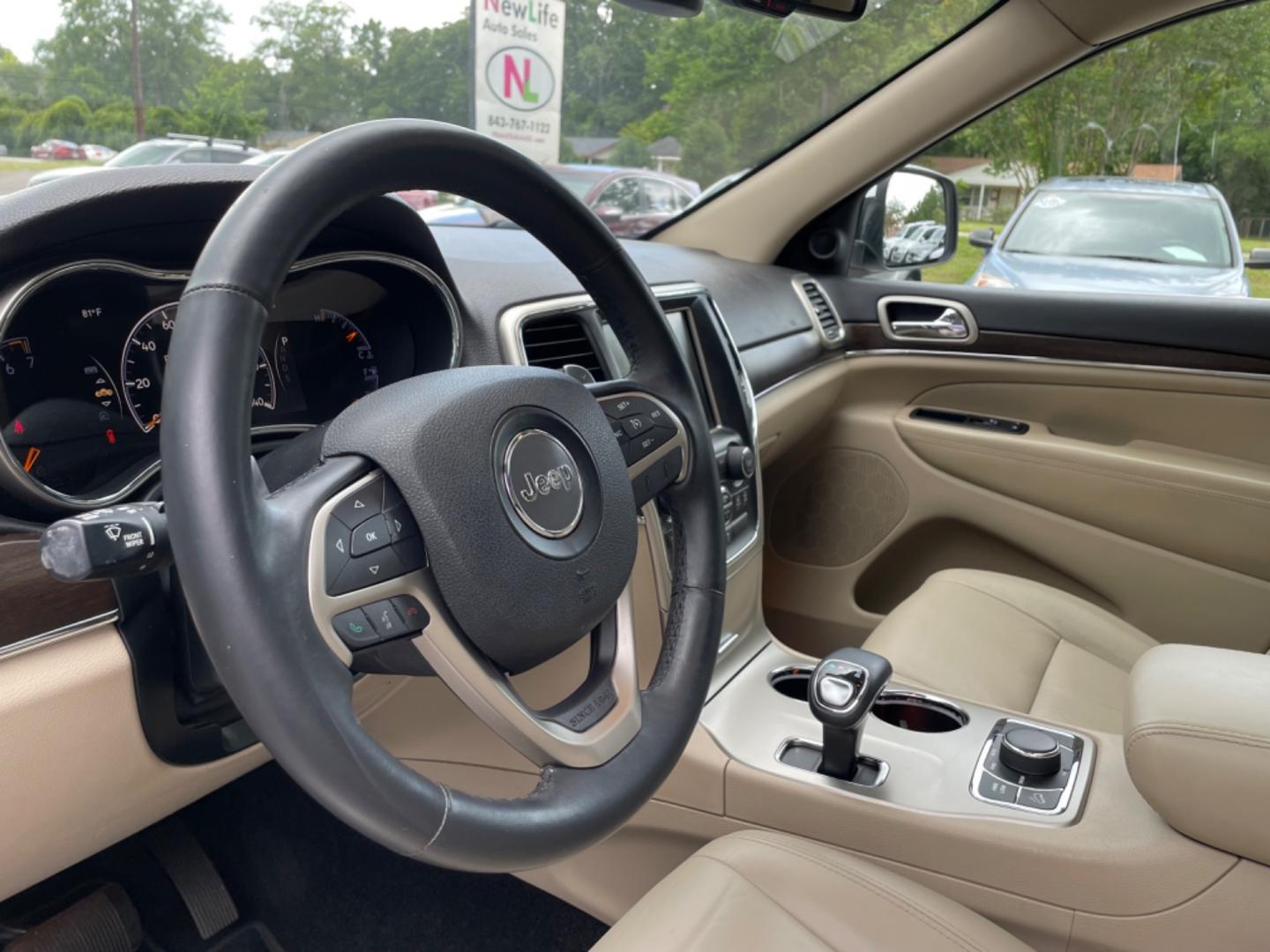 2014 WHITE JEEP GRAND CHEROKEE LIMITED (1C4RJFBG4EC) with an 3.6L engine, Automatic transmission, located at 5103 Dorchester Rd., Charleston, SC, 29418-5607, (843) 767-1122, 36.245171, -115.228050 - Local Trade-in with Leather, Sunroof, Navigation, Backup Camera, Bluetooth/AUX/Radio, Dual Climate Control, Power Everything (windows, locks, seats, mirrors), Heated/Memory Seats, Heated Steering Wheel, Power Liftgate, Rear Power Inverter, Rear Heated Seats, Push Button Start, Keyless Entry, Alloy W - Photo#22