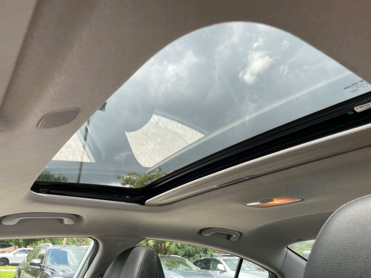 2015 SILVER KIA FORTE EX (KNAFZ4A86F5) with an 2.0L engine, Automatic transmission, located at 5103 Dorchester Rd., Charleston, SC, 29418-5607, (843) 767-1122, 36.245171, -115.228050 - Local Trade-in with Leather, Sunroof, Backup Camera, CD/AUX/Sat, Hands-free Phone, Power Everything (windows, locks, seats, mirrors), Heated/Cooled/Memory Front Seats, Heated Rear Seats, Heated Rear Seats, Keyless Entry, Alloy Wheels. Clean CarFax (no accidents reported!) 132k miles Located at New - Photo#21