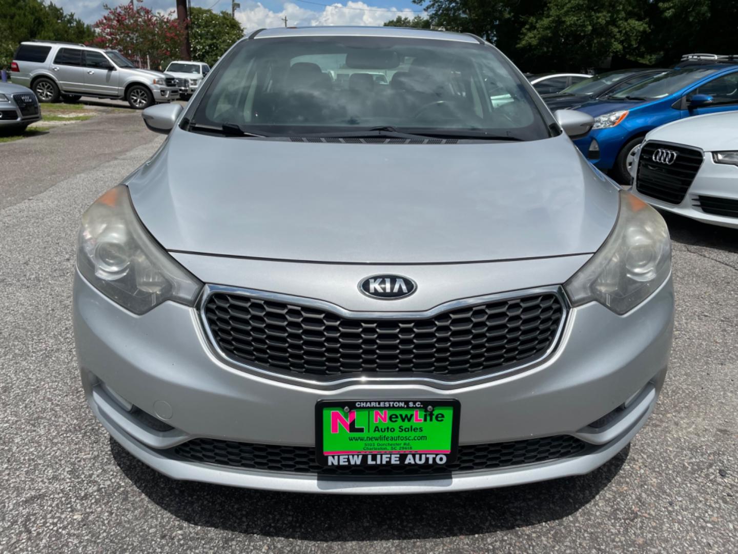 2015 SILVER KIA FORTE EX (KNAFZ4A86F5) with an 2.0L engine, Automatic transmission, located at 5103 Dorchester Rd., Charleston, SC, 29418-5607, (843) 767-1122, 36.245171, -115.228050 - Local Trade-in with Leather, Sunroof, Backup Camera, CD/AUX/Sat, Hands-free Phone, Power Everything (windows, locks, seats, mirrors), Heated/Cooled/Memory Front Seats, Heated Rear Seats, Heated Rear Seats, Keyless Entry, Alloy Wheels. Clean CarFax (no accidents reported!) 132k miles Located at New - Photo#1