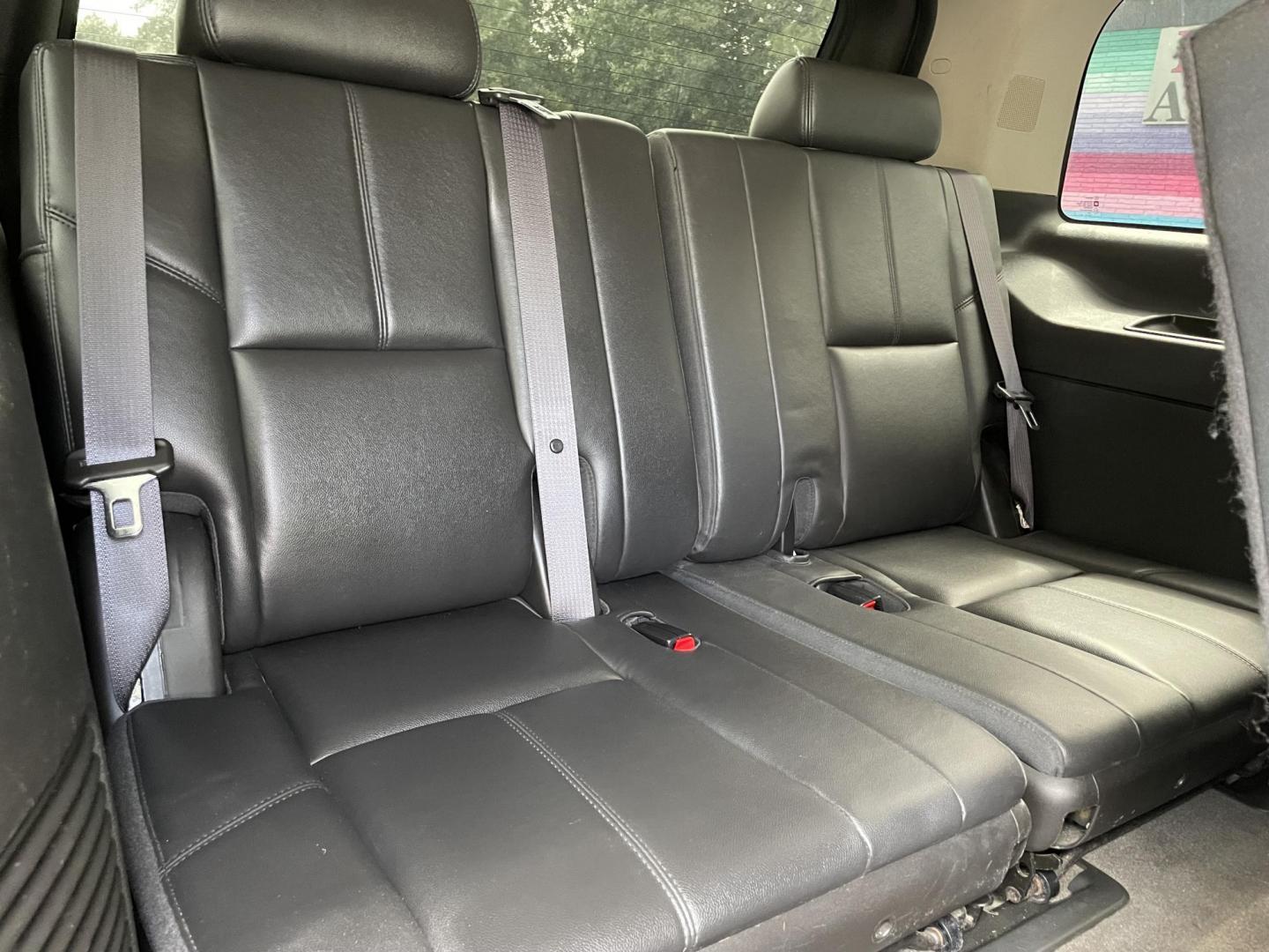 2013 GOLD GMC YUKON SLT (1GKS2CE08DR) with an 5.3L engine, Automatic transmission, located at 5103 Dorchester Rd., Charleston, SC, 29418-5607, (843) 767-1122, 36.245171, -115.228050 - Clean Interior with Leather, CD/AUX/Sat, OnStar, Dual Climate, Power Everything (windows, locks, seats, mirrors), Heated Seats, Convenient Third Row, Rear Climate Control, Keyless Entry, Tow Package, Alloy Wheels. Clean CarFax (no accidents reported!) 185k miles Located at New Life Auto Sales! 2023 - Photo#12