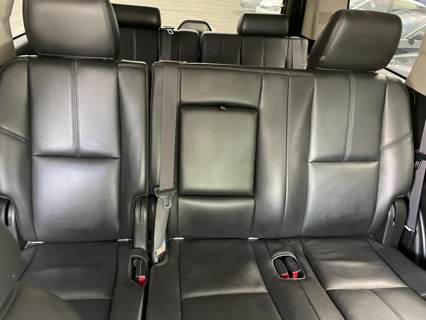 2013 GOLD GMC YUKON SLT (1GKS2CE08DR) with an 5.3L engine, Automatic transmission, located at 5103 Dorchester Rd., Charleston, SC, 29418-5607, (843) 767-1122, 36.245171, -115.228050 - Clean Interior with Leather, CD/AUX/Sat, OnStar, Dual Climate, Power Everything (windows, locks, seats, mirrors), Heated Seats, Convenient Third Row, Rear Climate Control, Keyless Entry, Tow Package, Alloy Wheels. Clean CarFax (no accidents reported!) 185k miles Located at New Life Auto Sales! 2023 - Photo#9