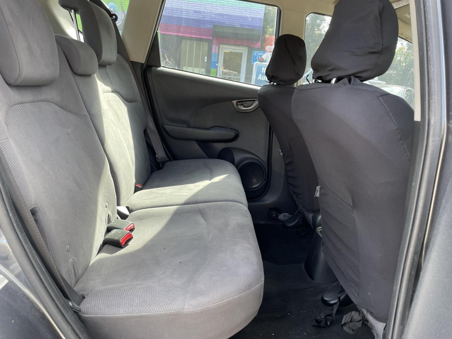 2013 GRAY HONDA FIT BASE (JHMGE8H36DC) with an 1.5L engine, Automatic transmission, located at 5103 Dorchester Rd., Charleston, SC, 29418-5607, (843) 767-1122, 36.245171, -115.228050 - Clean Interior with CD/AUX/AM/FM, Power Windows, Keyless Entry, Spacious Cargo! Local Trade-in!!167k miles Located at New Life Auto Sales! 2023 WINNER for Post & Courier's Charleston's Choice Pre-owned Car Dealer AND 2018-2024 Top 5 Finalist for Charleston City Paper's BEST PLACE TO BUY A USED CAR! - Photo#11