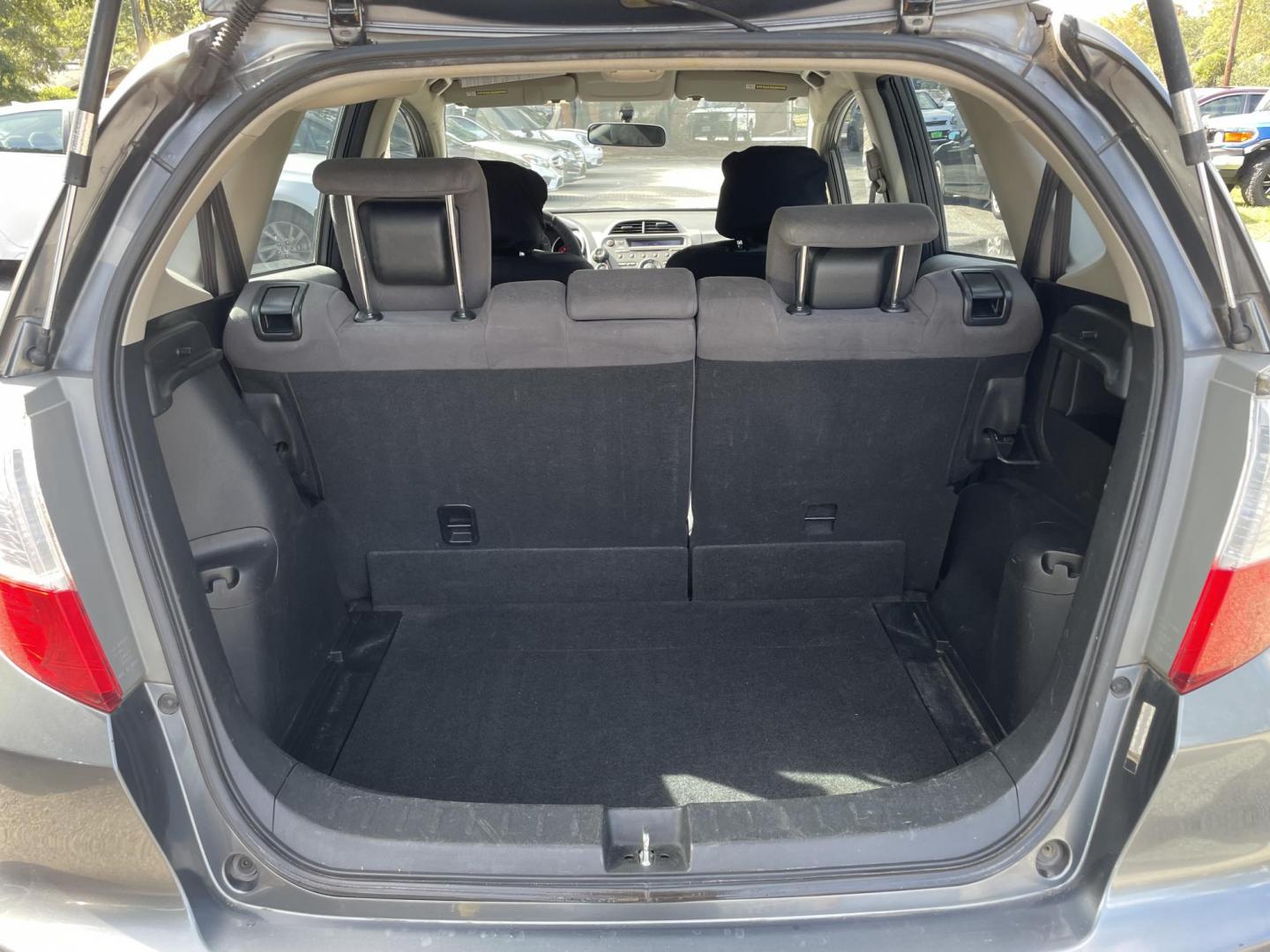 2013 GRAY HONDA FIT BASE (JHMGE8H36DC) with an 1.5L engine, Automatic transmission, located at 5103 Dorchester Rd., Charleston, SC, 29418-5607, (843) 767-1122, 36.245171, -115.228050 - Clean Interior with CD/AUX/AM/FM, Power Windows, Keyless Entry, Spacious Cargo! Local Trade-in!!167k miles Located at New Life Auto Sales! 2023 WINNER for Post & Courier's Charleston's Choice Pre-owned Car Dealer AND 2018-2024 Top 5 Finalist for Charleston City Paper's BEST PLACE TO BUY A USED CAR! - Photo#13