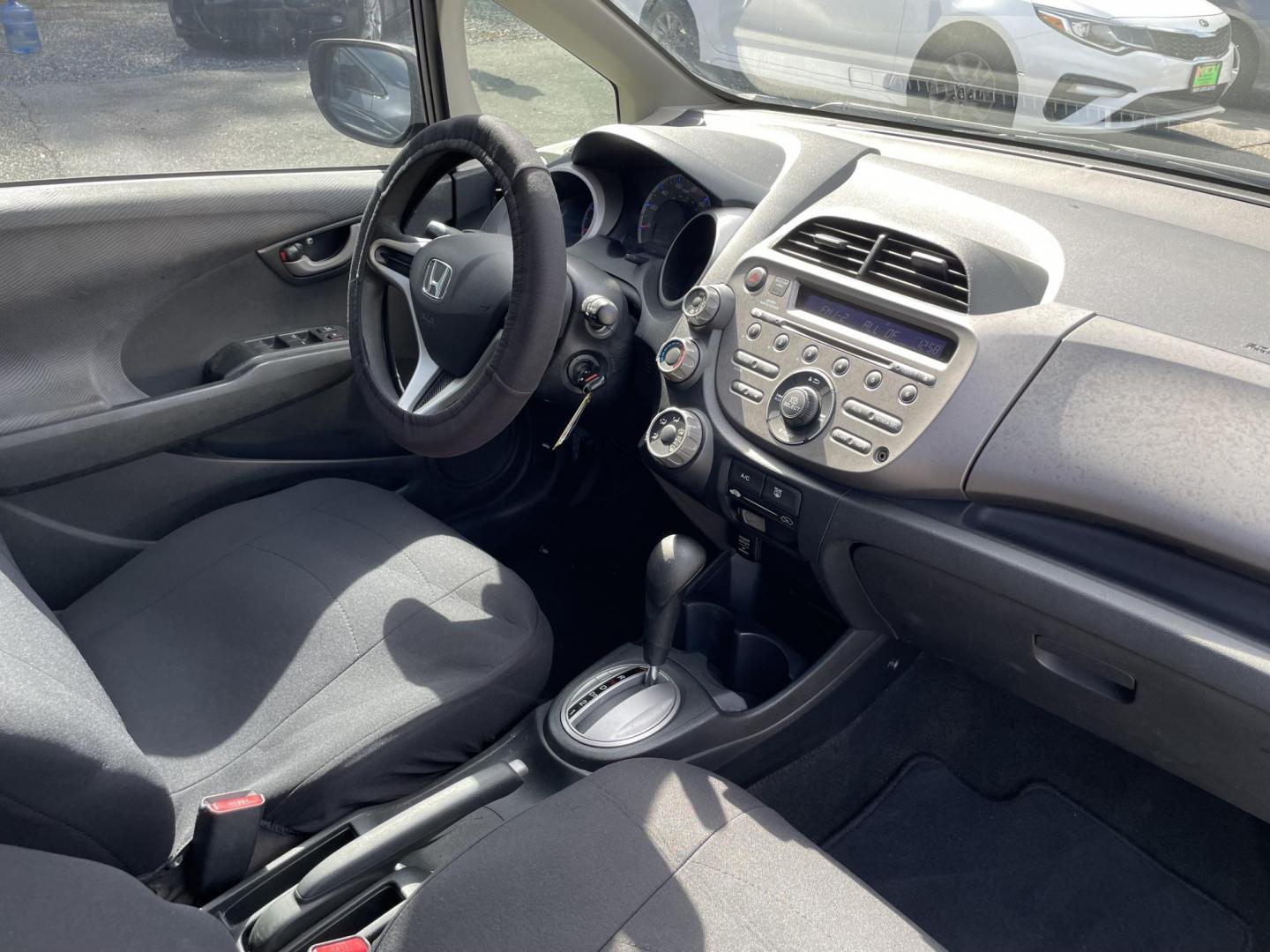 2013 GRAY HONDA FIT BASE (JHMGE8H36DC) with an 1.5L engine, Automatic transmission, located at 5103 Dorchester Rd., Charleston, SC, 29418-5607, (843) 767-1122, 36.245171, -115.228050 - Clean Interior with CD/AUX/AM/FM, Power Windows, Keyless Entry, Spacious Cargo! Local Trade-in!!167k miles Located at New Life Auto Sales! 2023 WINNER for Post & Courier's Charleston's Choice Pre-owned Car Dealer AND 2018-2024 Top 5 Finalist for Charleston City Paper's BEST PLACE TO BUY A USED CAR! - Photo#8