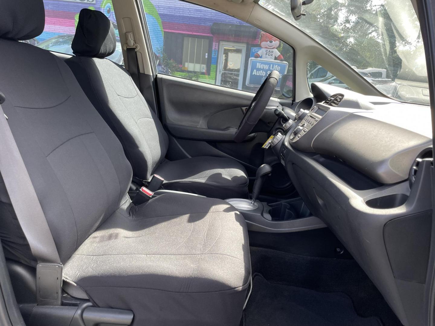 2013 GRAY HONDA FIT BASE (JHMGE8H36DC) with an 1.5L engine, Automatic transmission, located at 5103 Dorchester Rd., Charleston, SC, 29418-5607, (843) 767-1122, 36.245171, -115.228050 - Clean Interior with CD/AUX/AM/FM, Power Windows, Keyless Entry, Spacious Cargo! Local Trade-in!!167k miles Located at New Life Auto Sales! 2023 WINNER for Post & Courier's Charleston's Choice Pre-owned Car Dealer AND 2018-2024 Top 5 Finalist for Charleston City Paper's BEST PLACE TO BUY A USED CAR! - Photo#9
